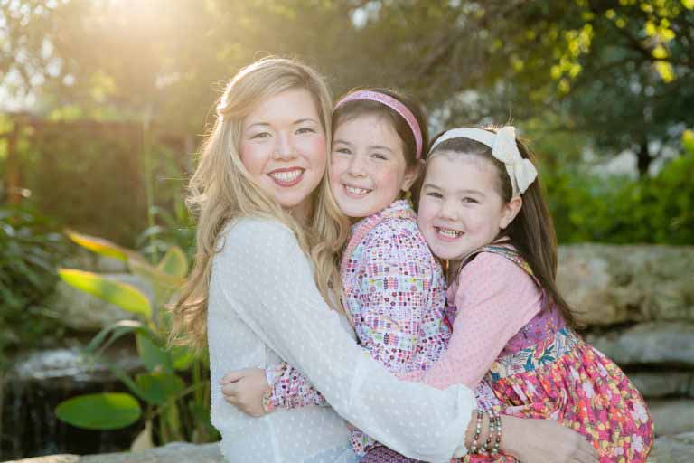 Valerie and her daughters - Survivor